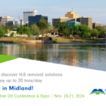 Skyline view of Midland, Texas from across lake. Text about visiting us in booth 519 to learn more about Merichem Technologies H2S removal solutions