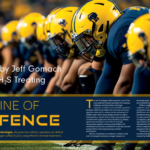 Football players in a row at the line of scrimmage ready to defend