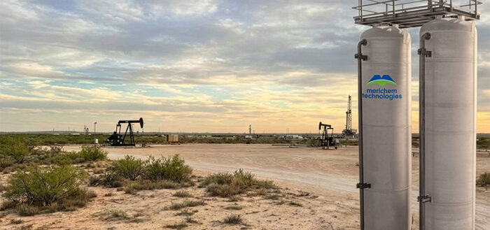 vertical lead/lag vessels in west Texas oil field against twilight sky